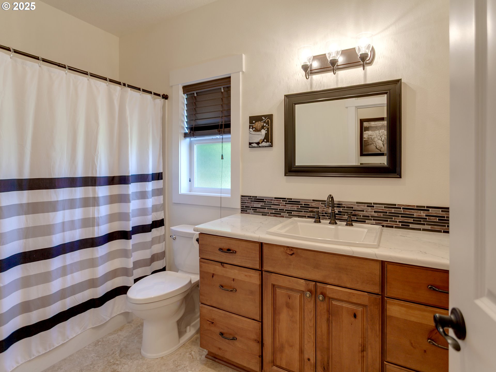 36280 Southeast Hauglum Road Sandy, OR 97055 - Photo 19 of 31 a bathroom with a toilet sink and mirror