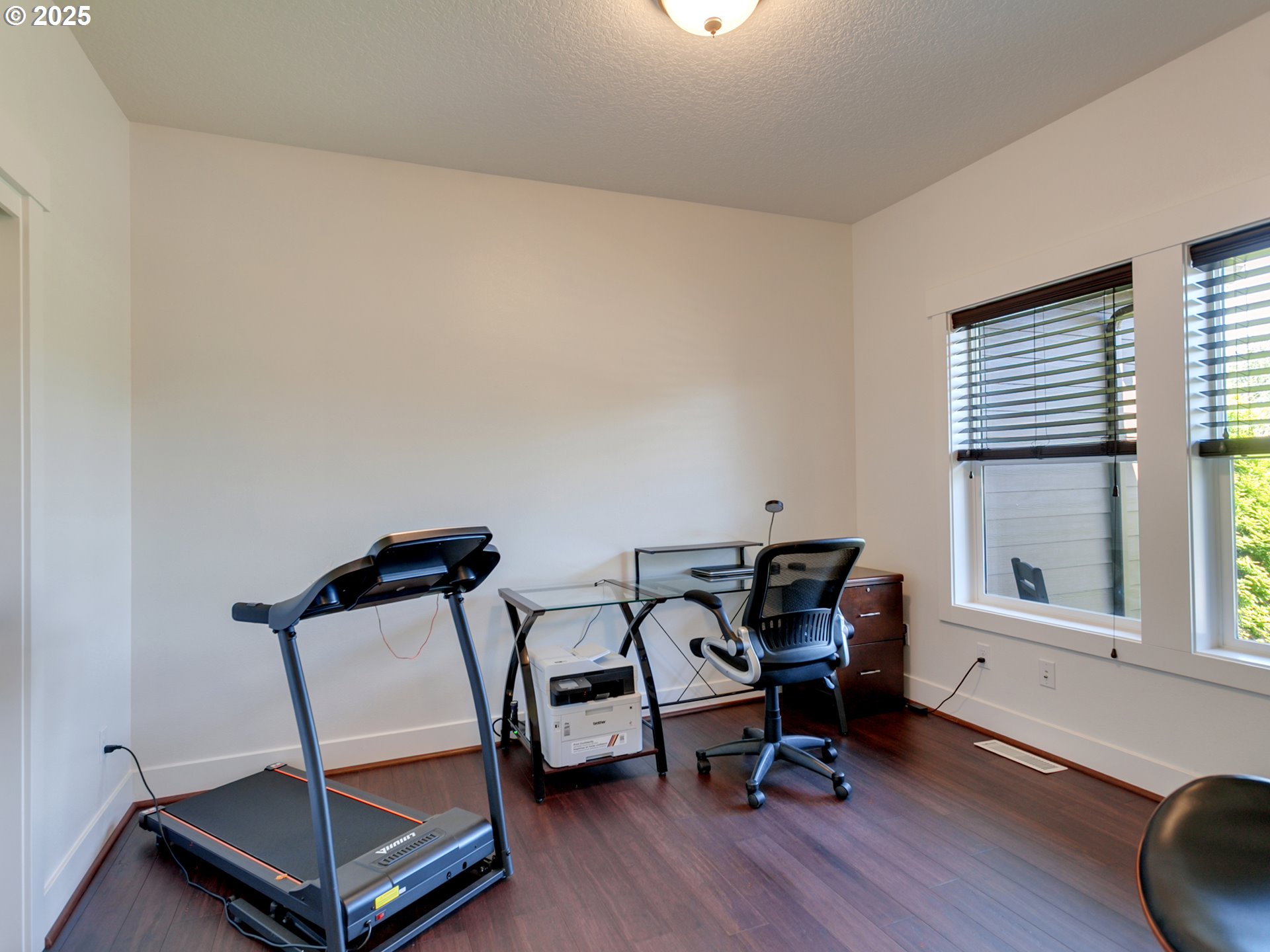 36280 Southeast Hauglum Road Sandy, OR 97055 - Photo 20 of 31 a view of a workspace with furniture and a window