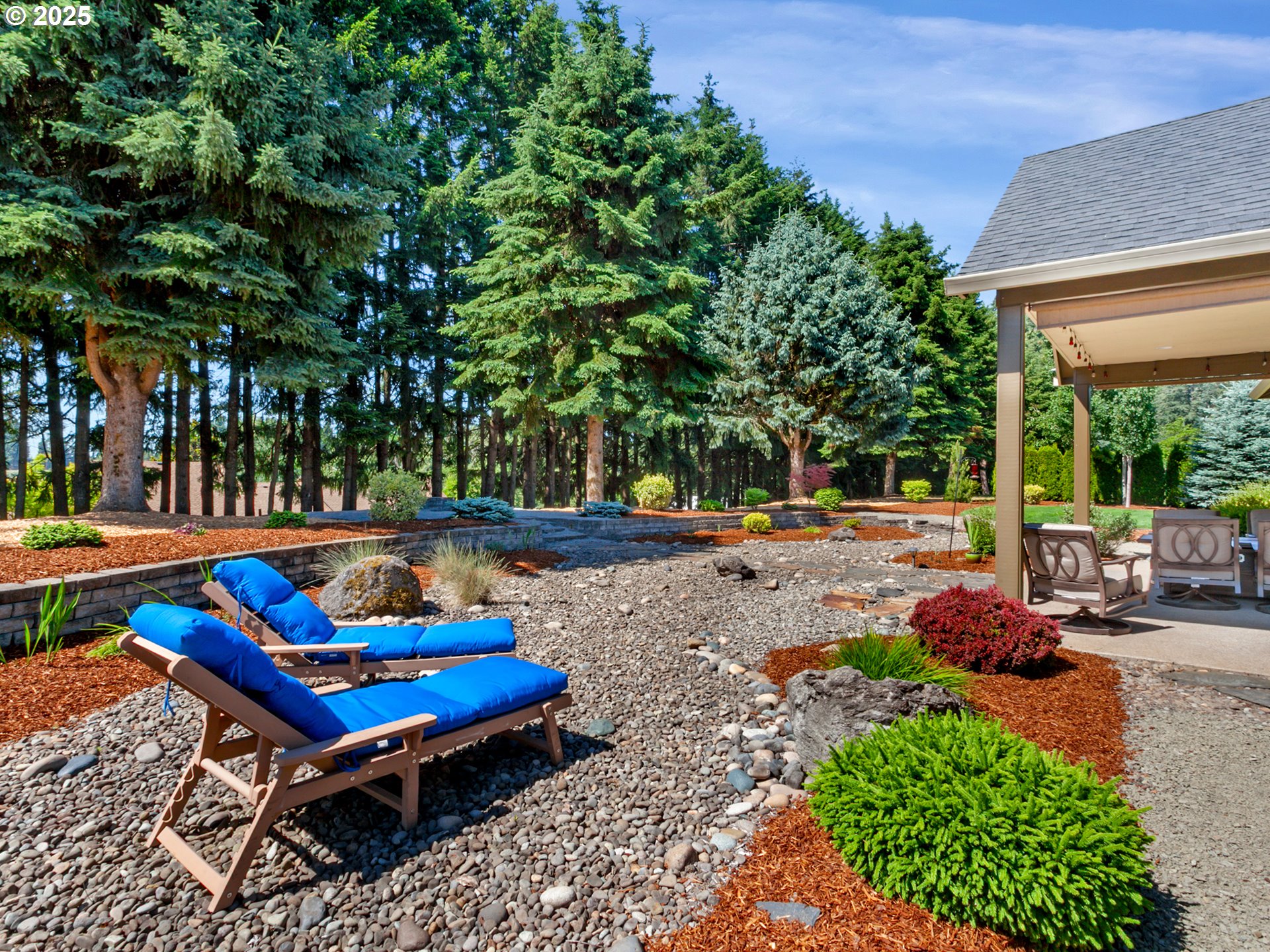 36280 Southeast Hauglum Road Sandy, OR 97055 - Photo 24 of 31 a backyard of a house with outdoor seating