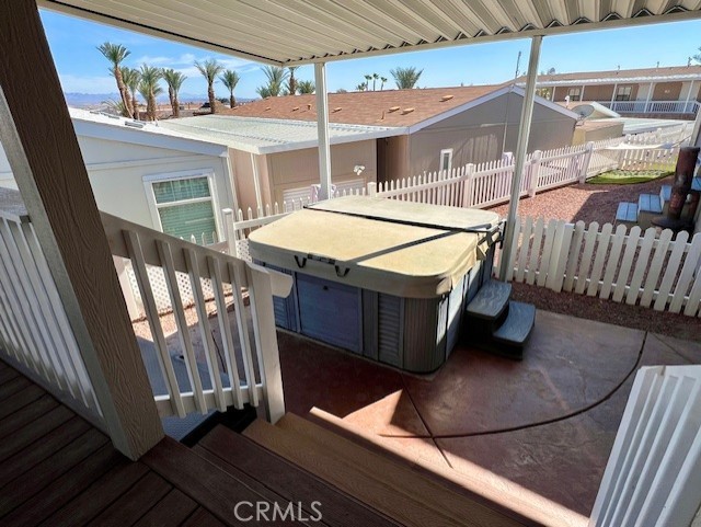 4170 Needles Highway, Unit 55 Needles, CA 92363 - Photo 20 of 39 a view of a balcony with furniture and front door