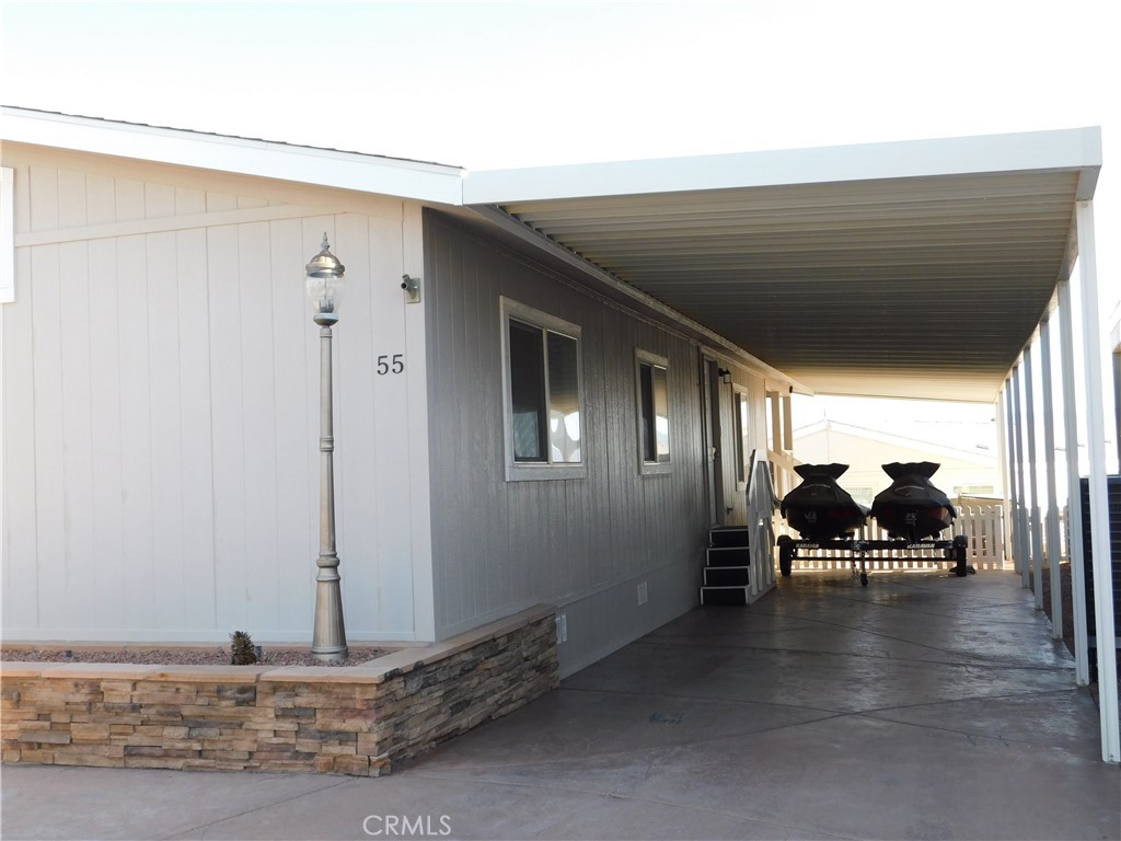 4170 Needles Highway, Unit 55 Needles, CA 92363 - Photo 2 of 39 a view of a room with gym equipment