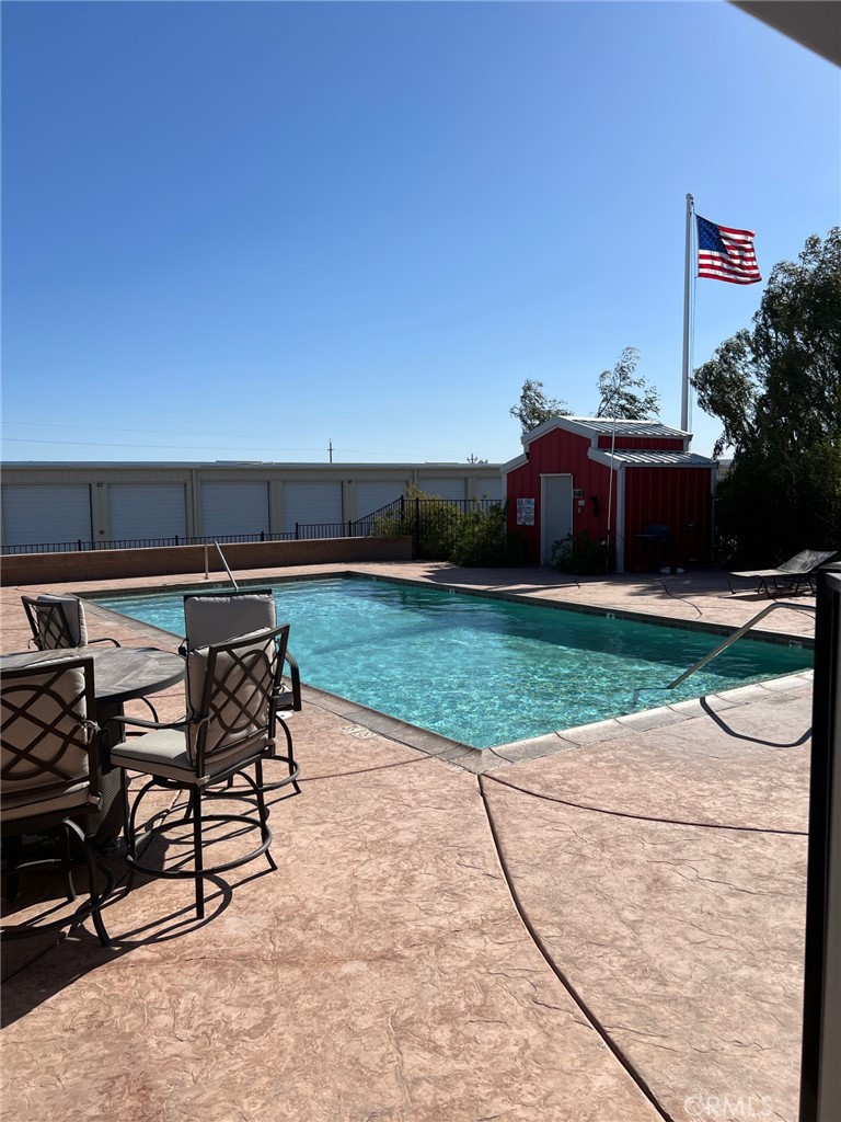 4170 Needles Highway, Unit 55 Needles, CA 92363 - Photo 32 of 39 a view of a chairs and tables in the patio