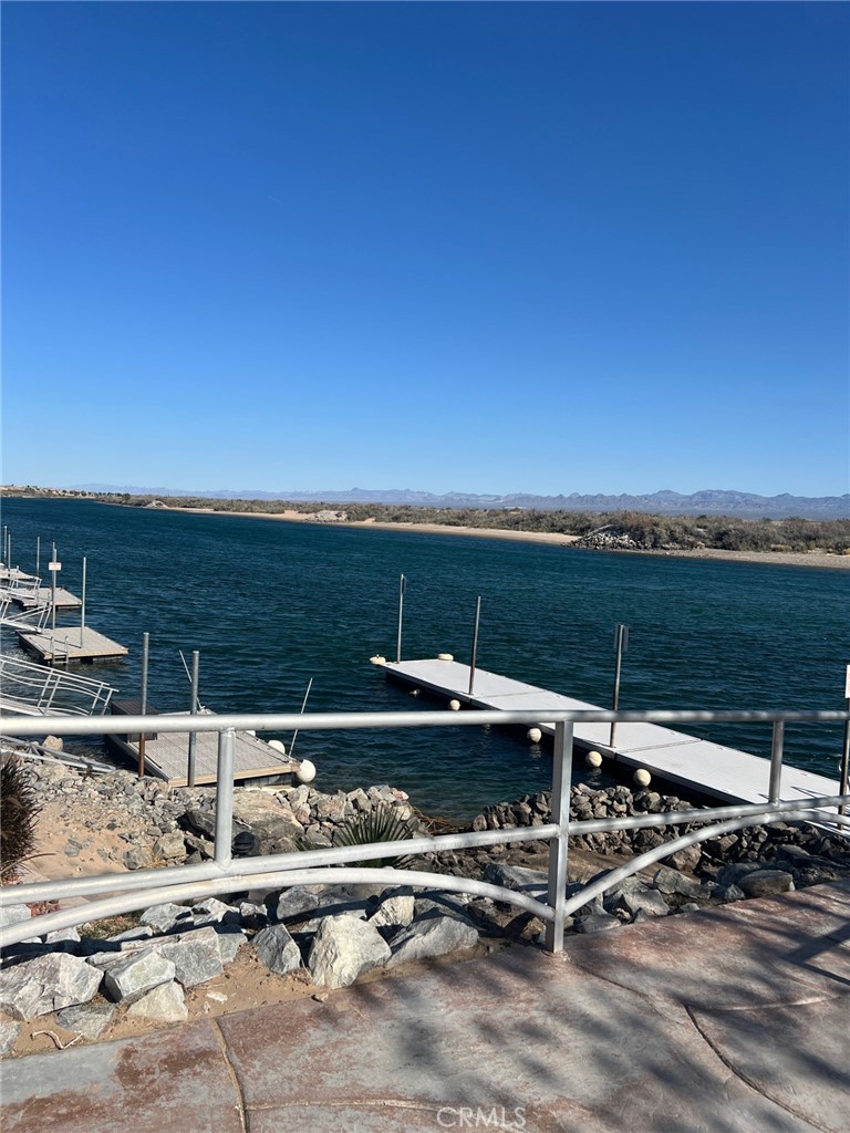 4170 Needles Highway, Unit 55 Needles, CA 92363 - Photo 35 of 39 a view of a terrace with two chairs