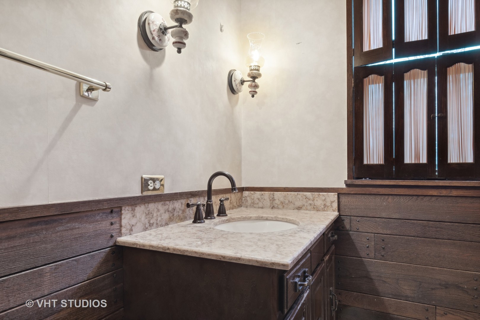 835 Heather Road Deerfield, IL 60015 - Photo 13 of 29 a bathroom with a sink and a mirror