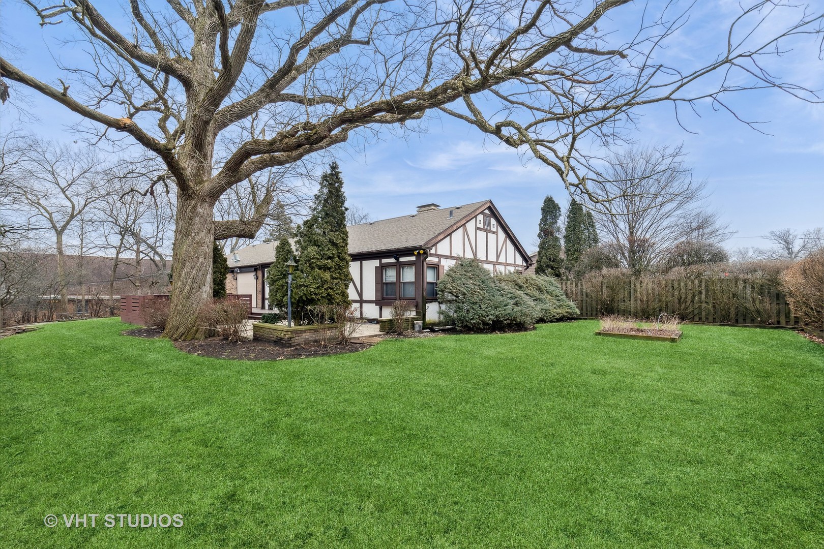 835 Heather Road Deerfield, IL 60015 - Photo 25 of 29 a view of a house with backyard and a tree
