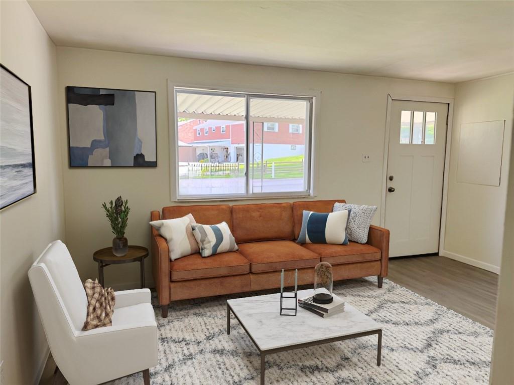 279 Olympic Road Pittsburgh, PA 15236 - Photo 5 of 25 a living room with furniture rug and window