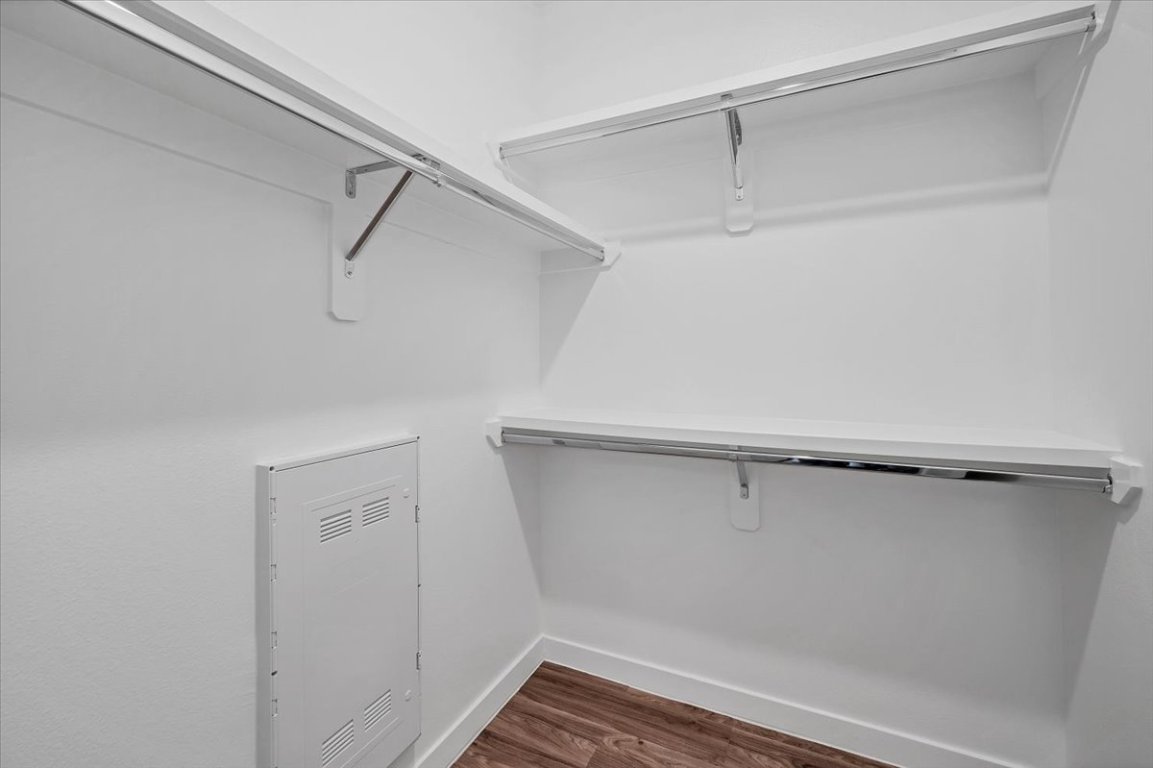 4801 Springdale Road, Unit 1402 Austin, TX 78723 - Photo 19 of 40 a view of a room with racks on the wall