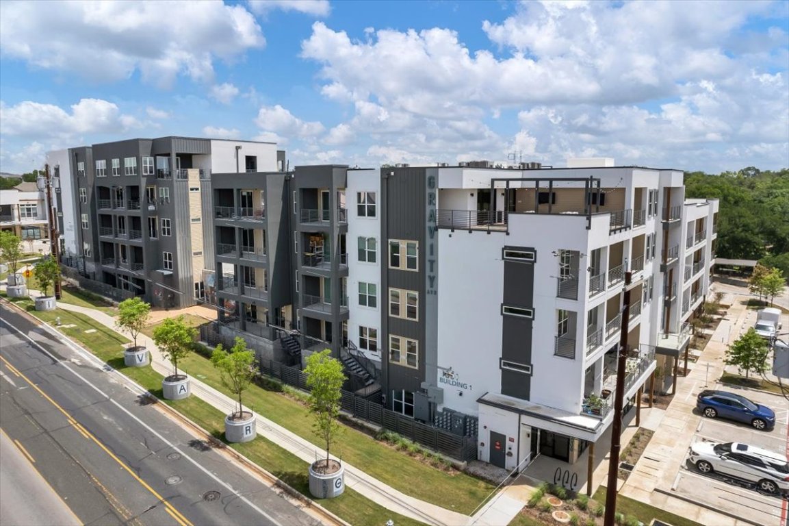 4801 Springdale Road, Unit 1402 Austin, TX 78723 - Photo 2 of 40 a view of residential houses with cars