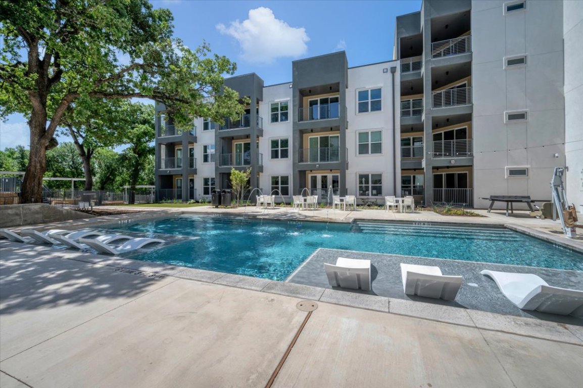 4801 Springdale Road, Unit 1402 Austin, TX 78723 - Photo 32 of 40 front view of an buildings with a pathway