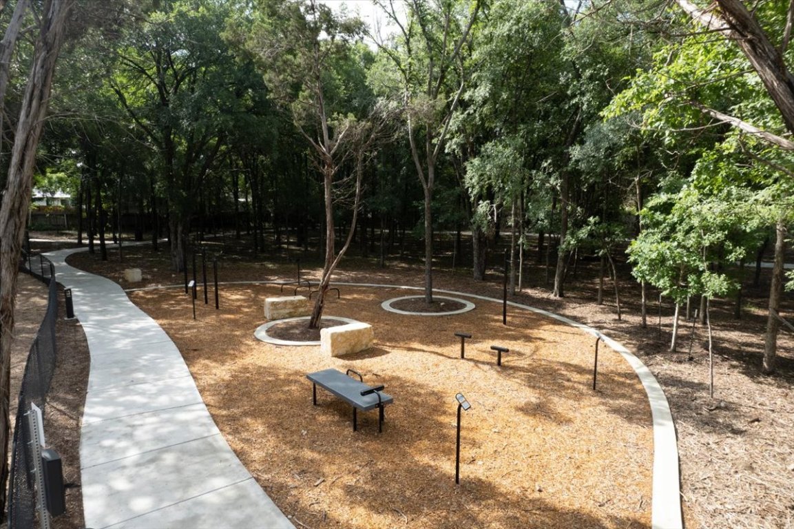 4801 Springdale Road, Unit 1402 Austin, TX 78723 - Photo 39 of 40 a view of a swimming pool with a patio