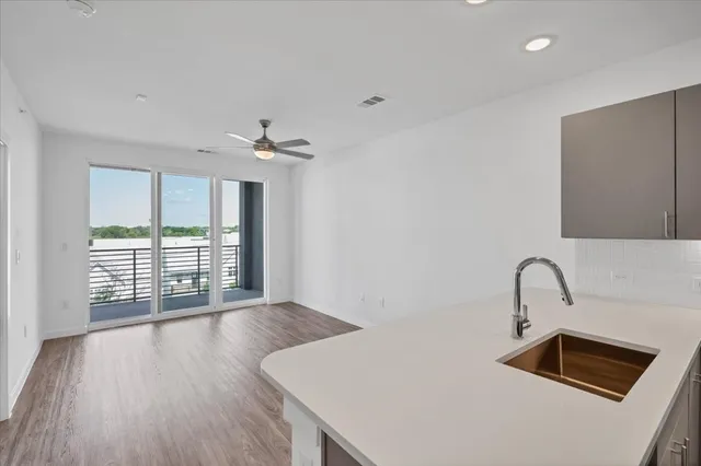 a bathroom with a sink and a window