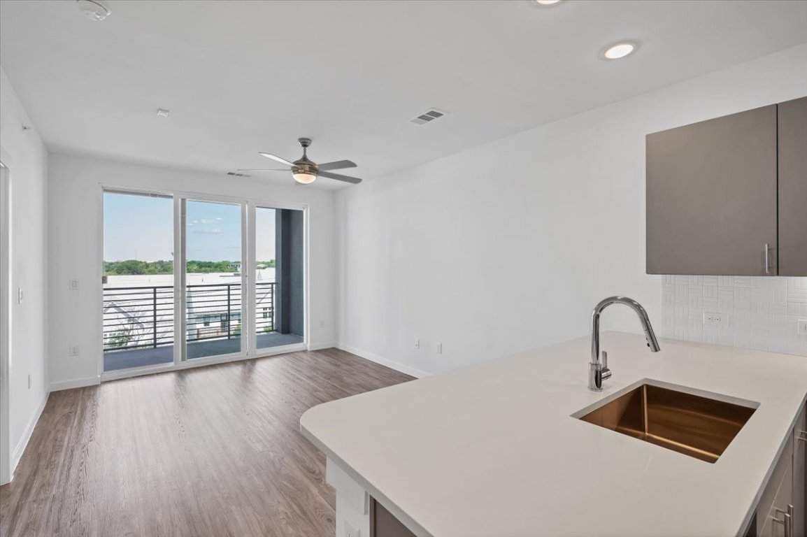 4801 Springdale Road, Unit 1402 Austin, TX 78723 - Photo 5 of 40 a bathroom with a sink and a window