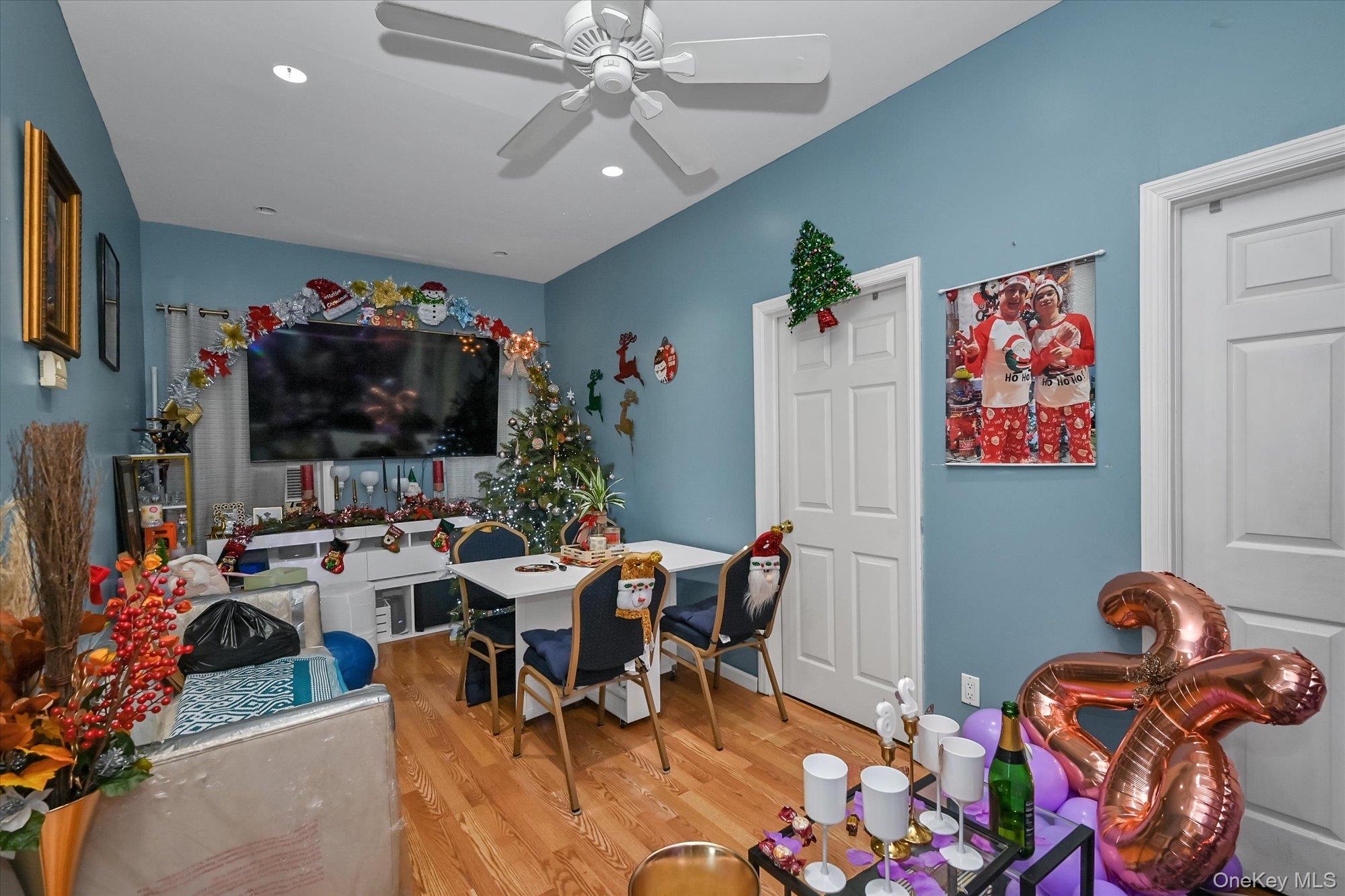69-25 59th Road Queens, NY 11378 - Photo 16 of 24 Playroom with light wood-type flooring, a ceiling fan, and recessed lighting