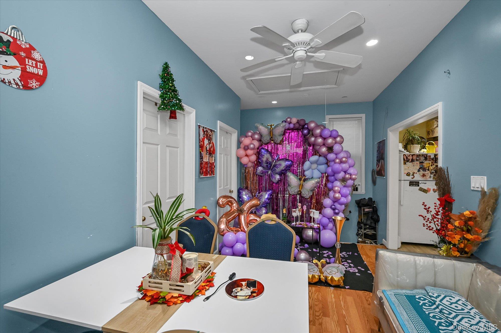 69-25 59th Road Queens, NY 11378 - Photo 17 of 24 Dining area with a ceiling fan, wood finished floors, and recessed lighting
