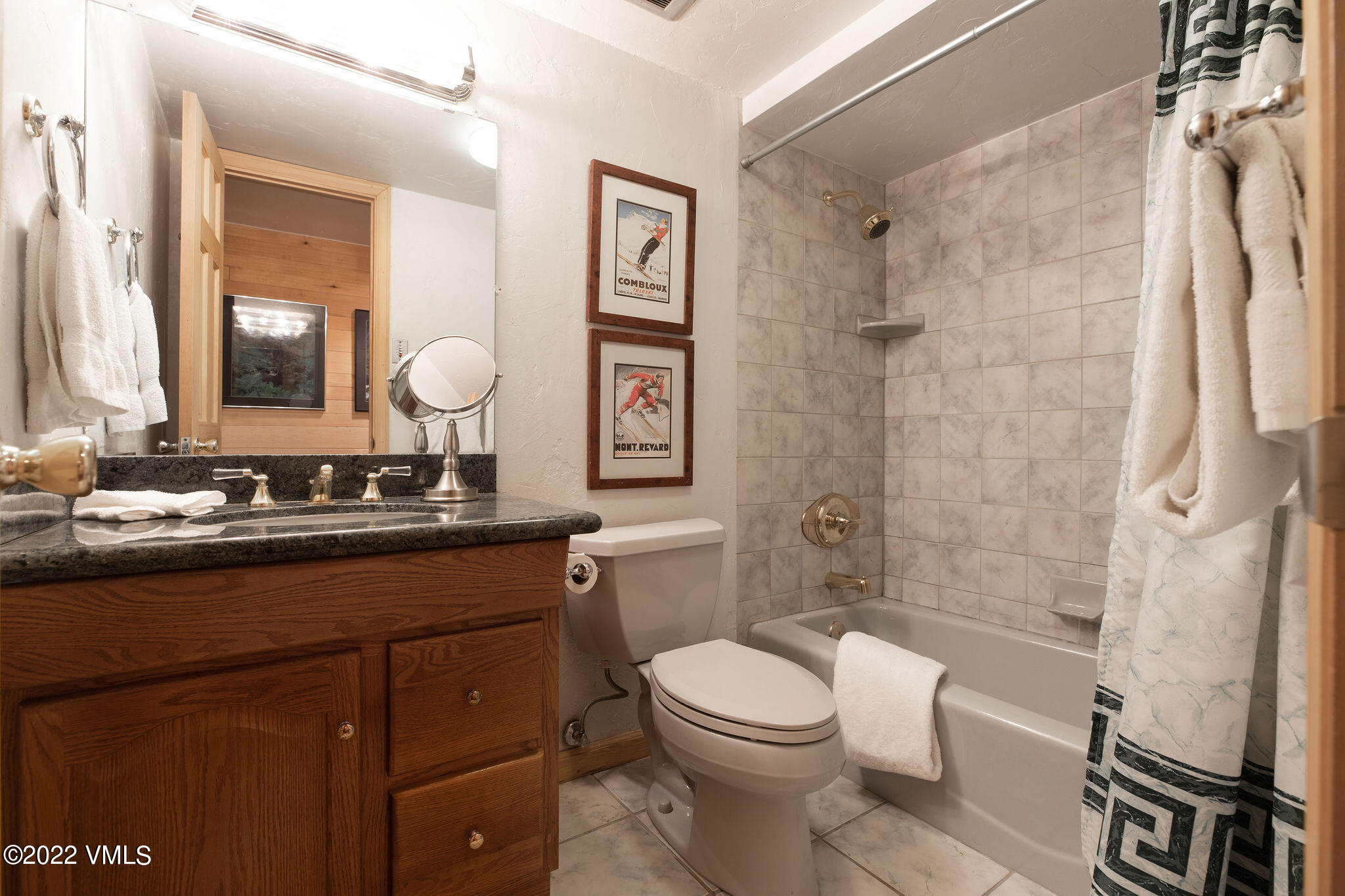 9 Vail Road, Unit 15 Vail, CO 81657 - Photo 12 of 18 a bathroom with a sink a toilet and shower