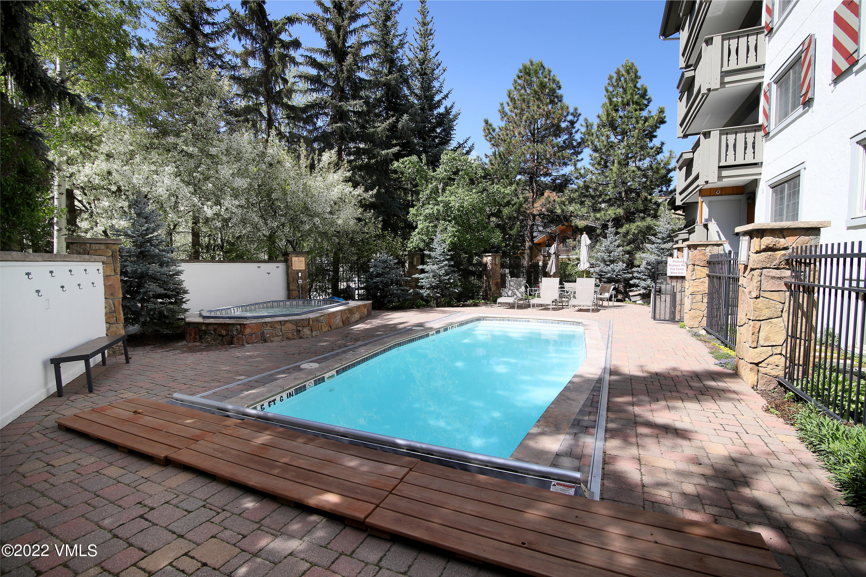 9 Vail Road, Unit 15 Vail, CO 81657 - Photo 13 of 18 a view of a yard with plants