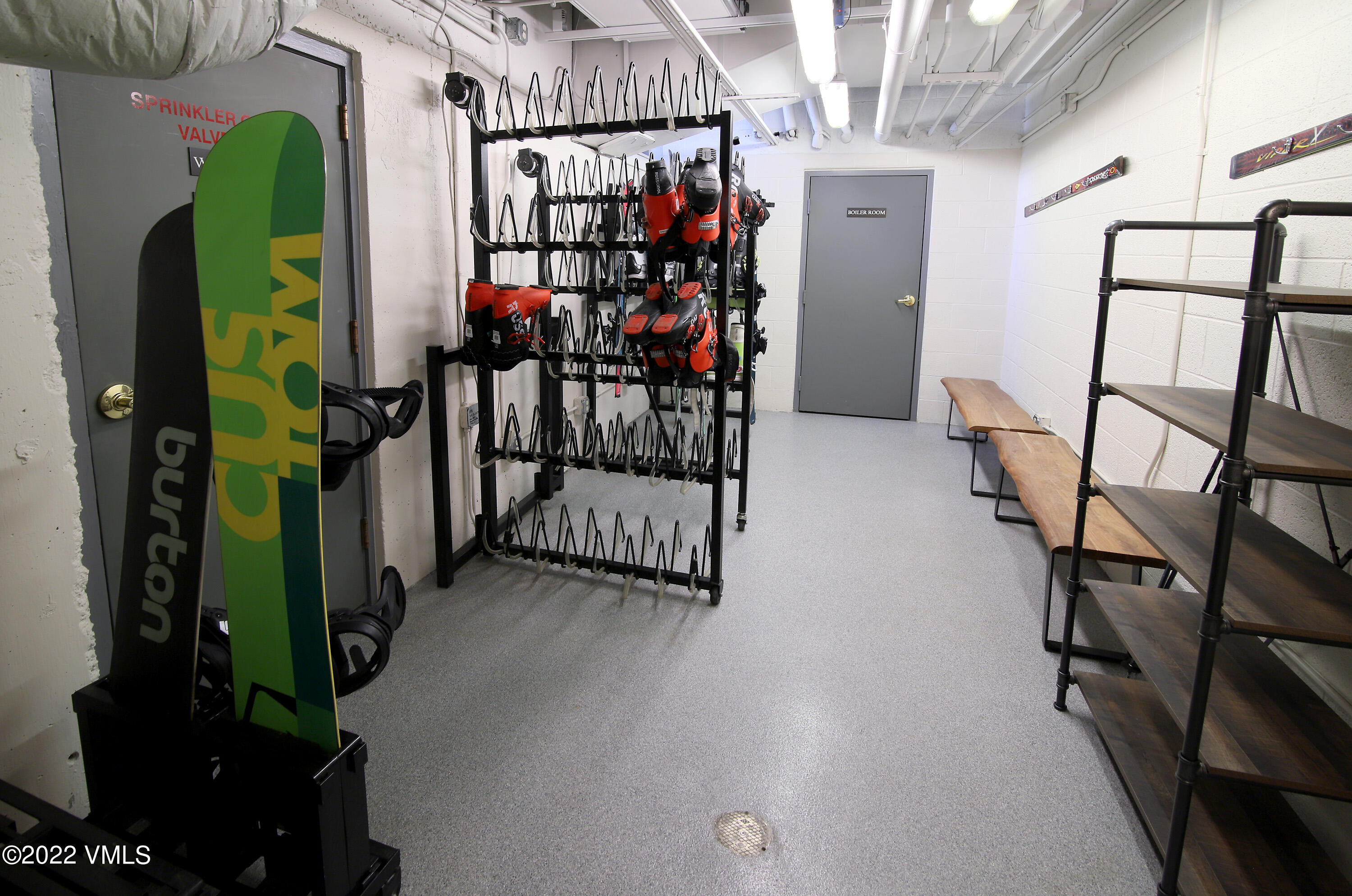 9 Vail Road, Unit 15 Vail, CO 81657 - Photo 17 of 18 a view of a room with racks on the wall