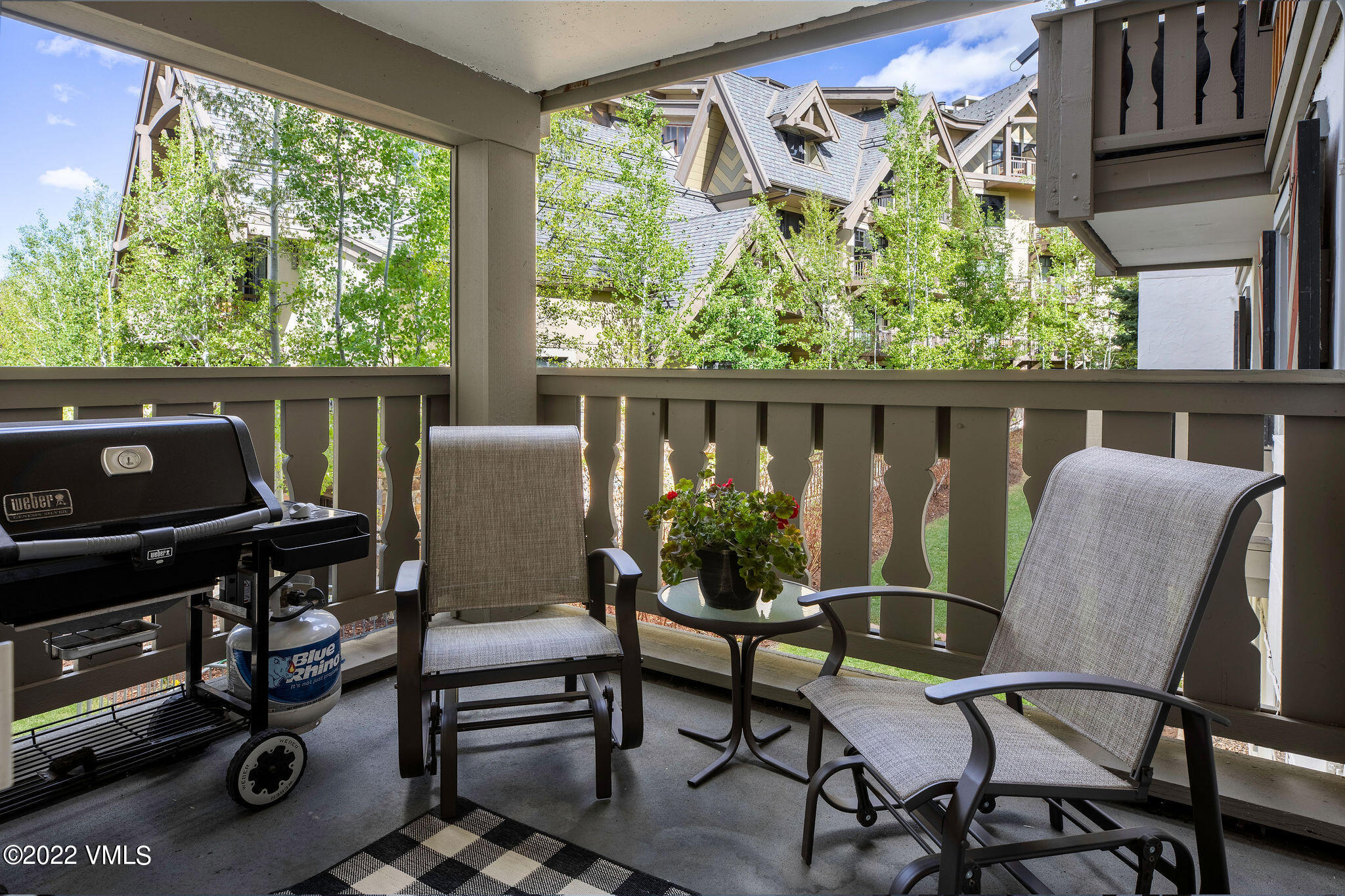 9 Vail Road, Unit 15 Vail, CO 81657 - Photo 7 of 18 a view of a chairs and table in a balcony