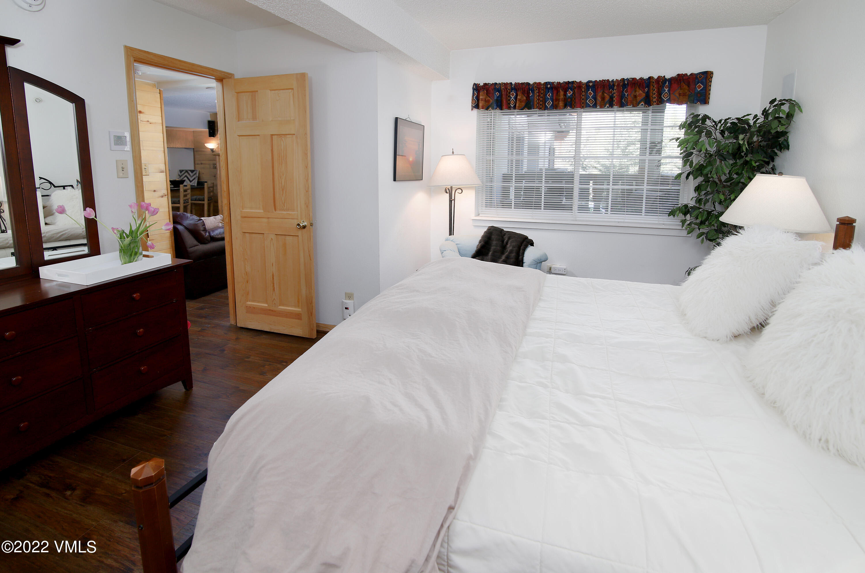 9 Vail Road, Unit 15 Vail, CO 81657 - Photo 9 of 18 a bedroom with a bed and a window