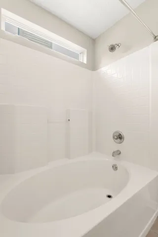 a bathroom with a bathtub