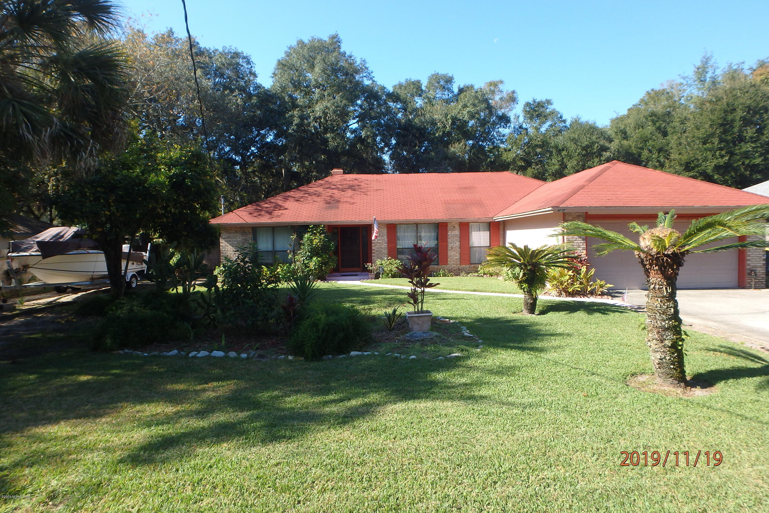 2064 Derringer Road Jacksonville, FL 32225 - Photo 1 of 17 a view of a house with a yard