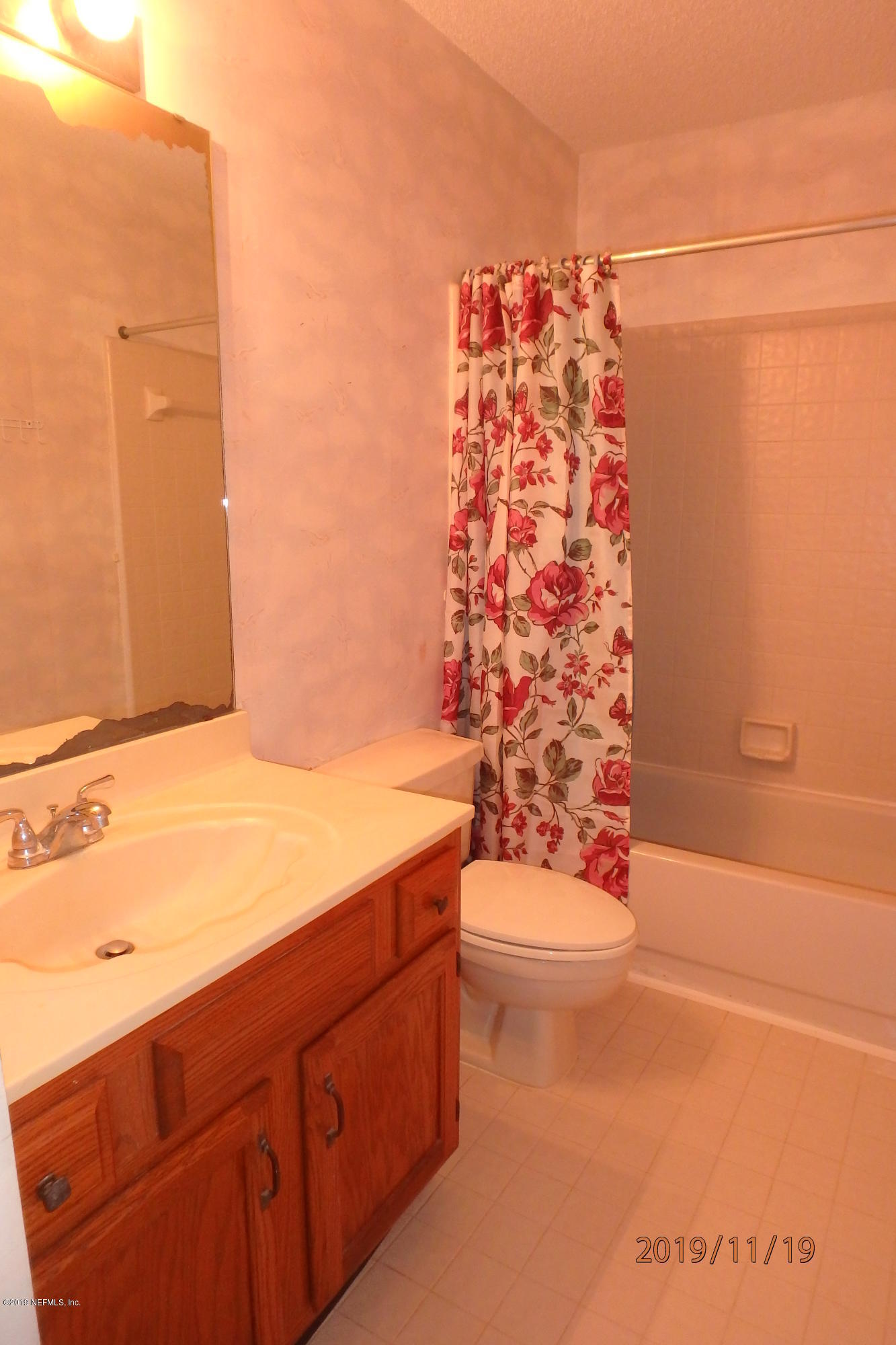 2064 Derringer Road Jacksonville, FL 32225 - Photo 12 of 17 a bathroom with a bathtub and shower