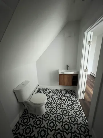 a bathroom with a sink and a toilet