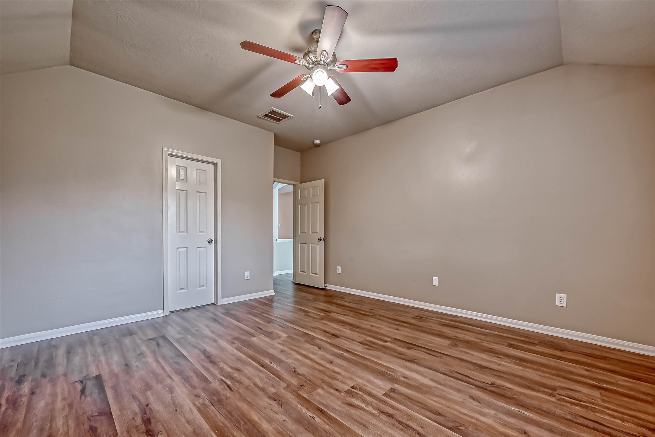 911 Bent Sail Lane League City, TX 77573 - Photo 28 of 34 a view of an empty room with wooden floor