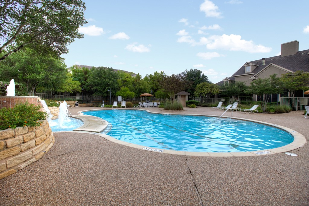 11203 Ranch Road 2222, Unit 1104 Austin, TX 78730 - Photo 22 of 23 Community pool with a patio area