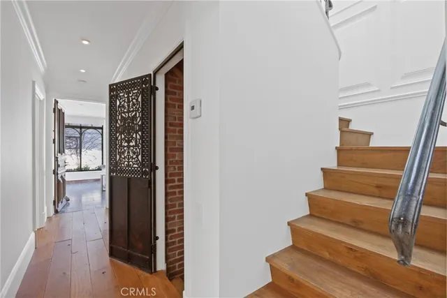 a view of entryway with wooden floor