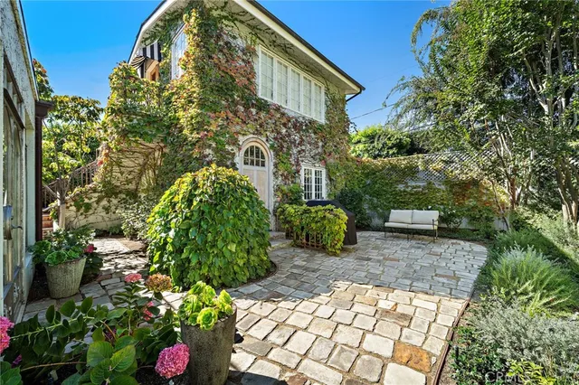 a view of a house with a garden