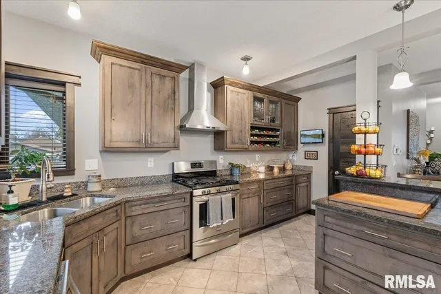 a view of a dining area with furniture and a large window