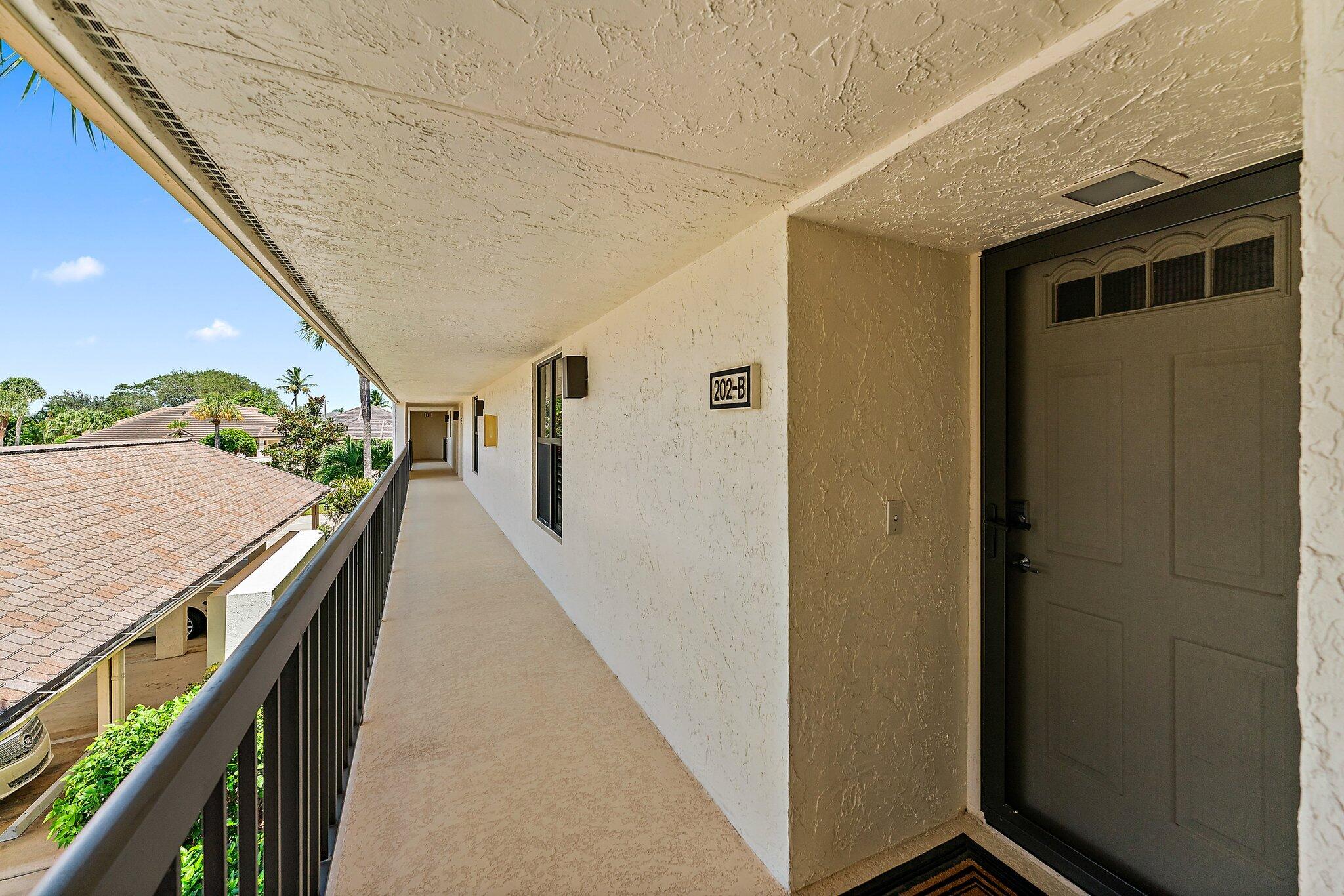19101 Southeast Sea Turtle Court, Unit 202 Jupiter, FL 33469 - Photo 5 of 35 a view of outdoor space and deck