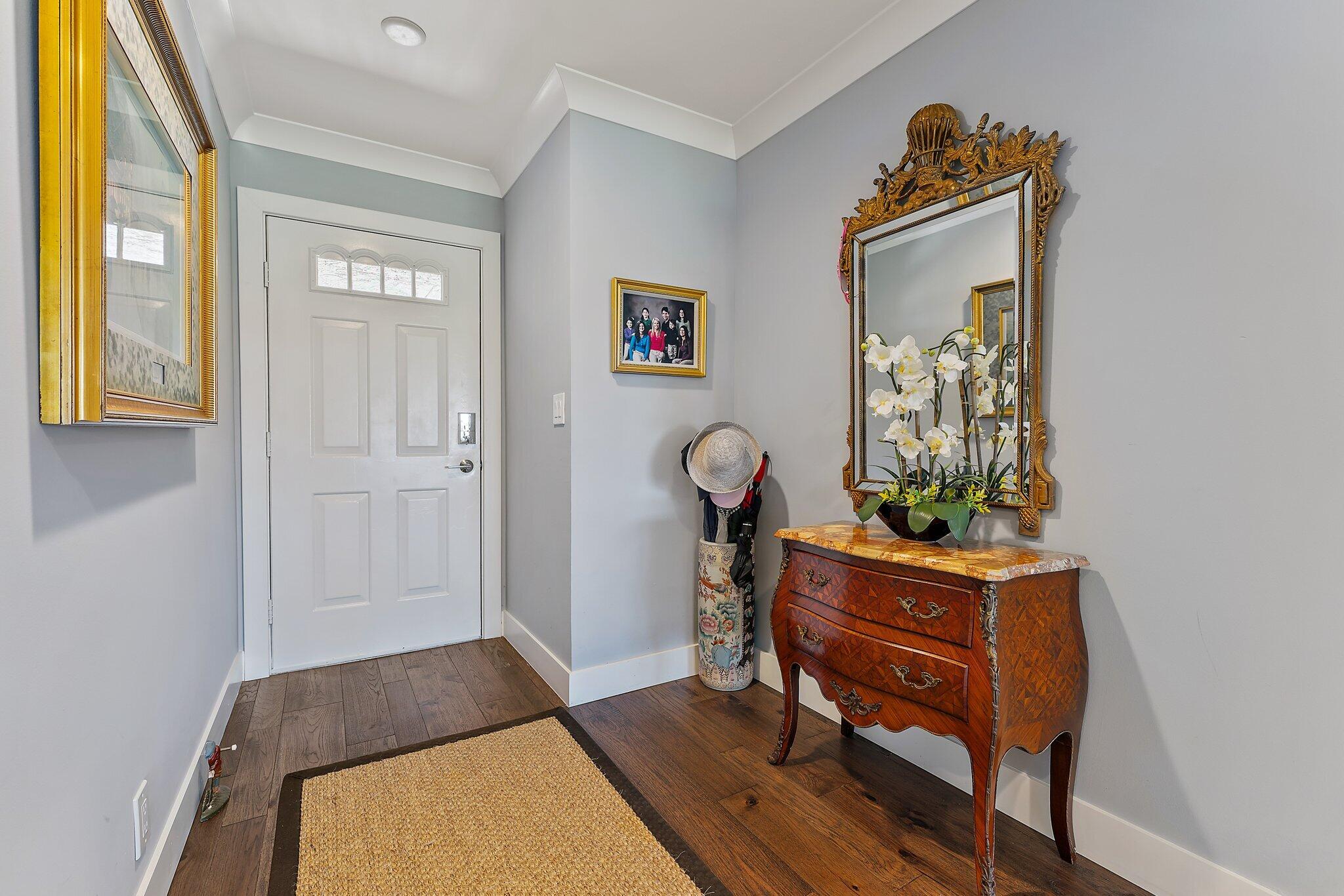 19101 Southeast Sea Turtle Court, Unit 202 Jupiter, FL 33469 - Photo 6 of 35 a living room with furniture and a window