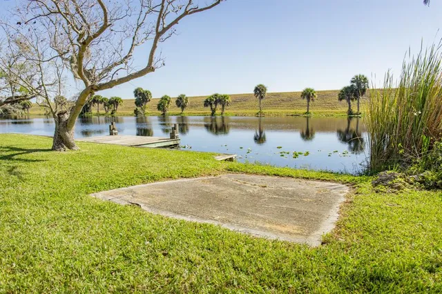 a view of yard with swimming pool
