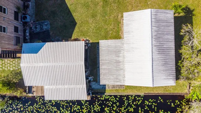 a view of a door with brick wall
