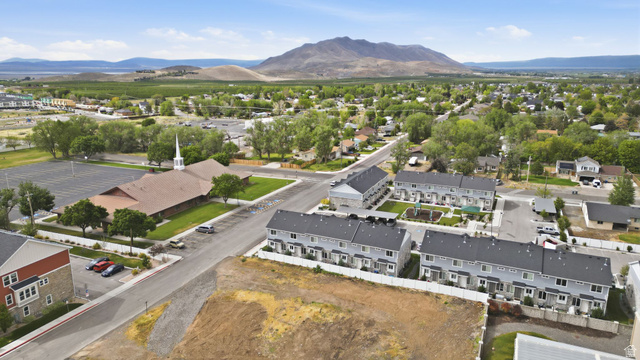 295 Spruce Way Santaquin, UT 84655 - Photo 28 of 32 Aerial perspective showcasing a residential area with mountains in the background
