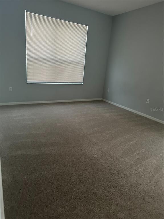 3078 Barbados Lane Haines City, FL 33844 - Photo 10 of 14 an empty room with a window