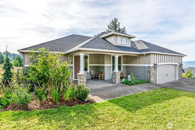 front view of a house with a yard