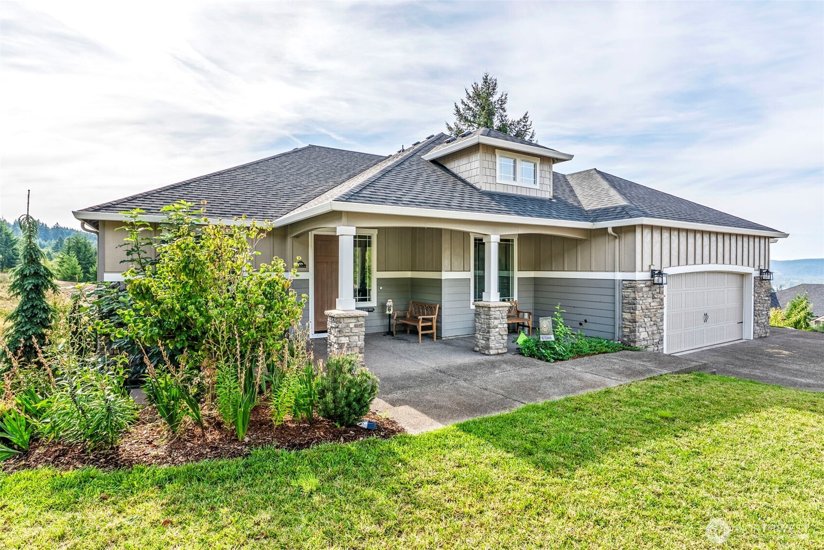 front view of a house with a yard