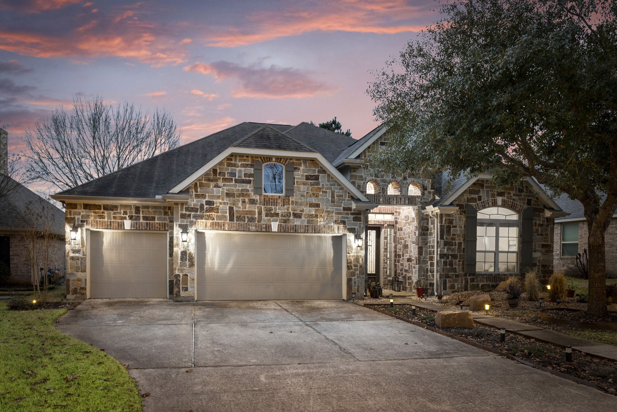 4787 Jackson Square Drive Conroe, TX 77304 - Photo 2 of 41 With this exceptional property, space and functionality meet in perfect harmony. The star of the show? An oversized 3-car garage that goes far beyond the ordinary. Whether you're an avid car enthusiast, a boat lover, or someone who’s been dreaming of a dedicated spot for your golf cart or workshop tools, this garage has you covered—and then some.