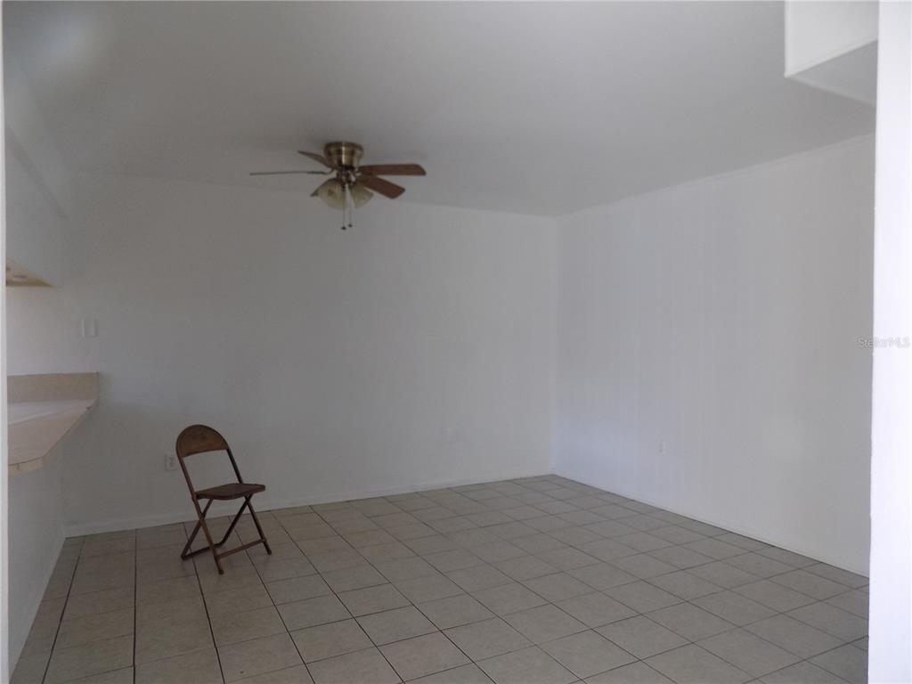 2811 Southwest Archer Road, Unit X 201 Gainesville, FL 32608 - Photo 6 of 29 a view of workspace with wooden floor