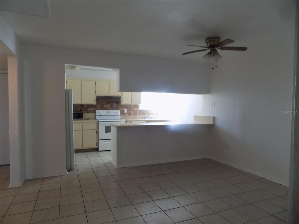 2811 Southwest Archer Road, Unit X 201 Gainesville, FL 32608 - Photo 10 of 29 a room with a cabinets