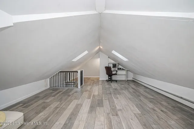 a view of entryway with wooden floor