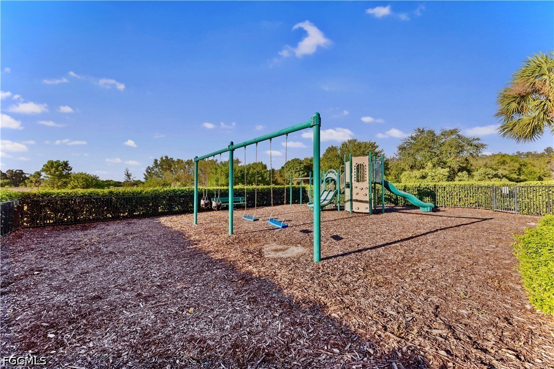 10781 Crossback Lane Lehigh Acres, FL 33974 - Photo 28 of 28 a view of a backyard