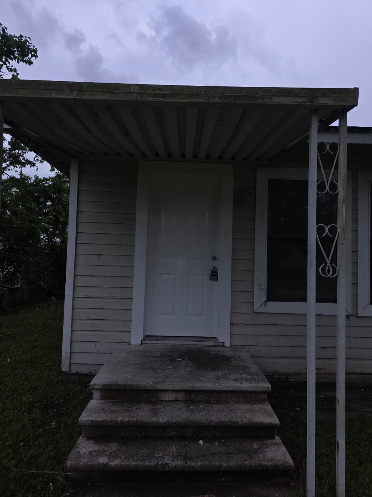 242 Bolden Street Houston, TX 77029 - Photo 2 of 24 a front view of a house with a garden