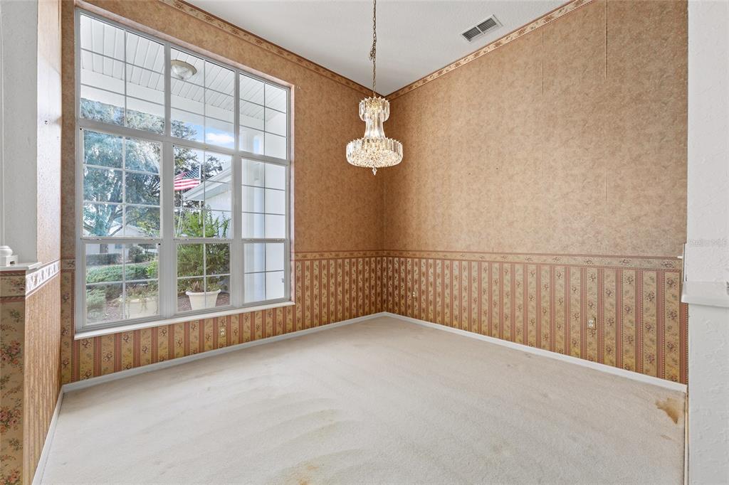 11621 Southwest 72nd Circle Ocala, FL 34476 - Photo 11 of 66 a view of a room with windows