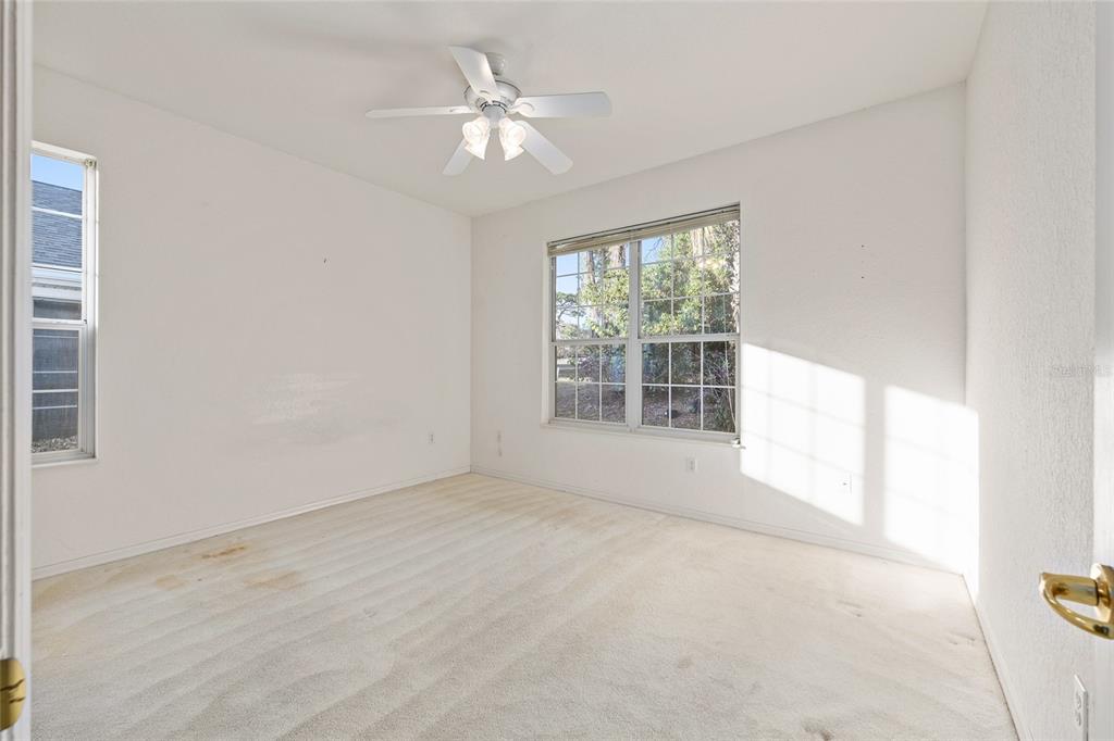 11621 Southwest 72nd Circle Ocala, FL 34476 - Photo 38 of 66 a view of an empty room with a window