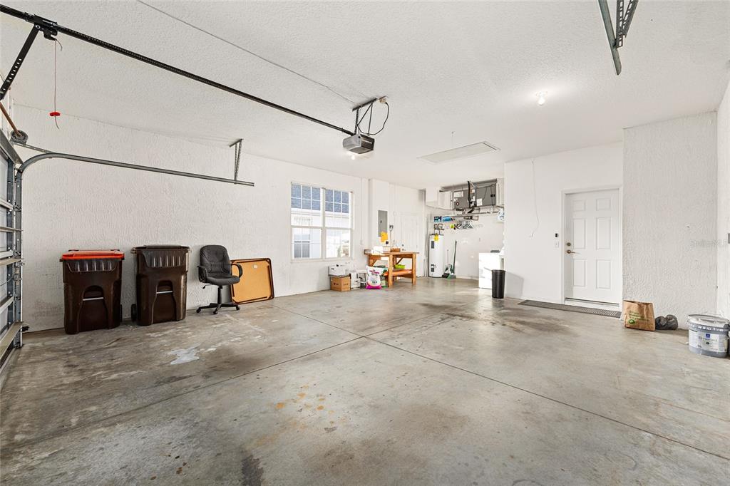 11621 Southwest 72nd Circle Ocala, FL 34476 - Photo 44 of 66 a view of a livingroom with a furniture and a ceiling fan
