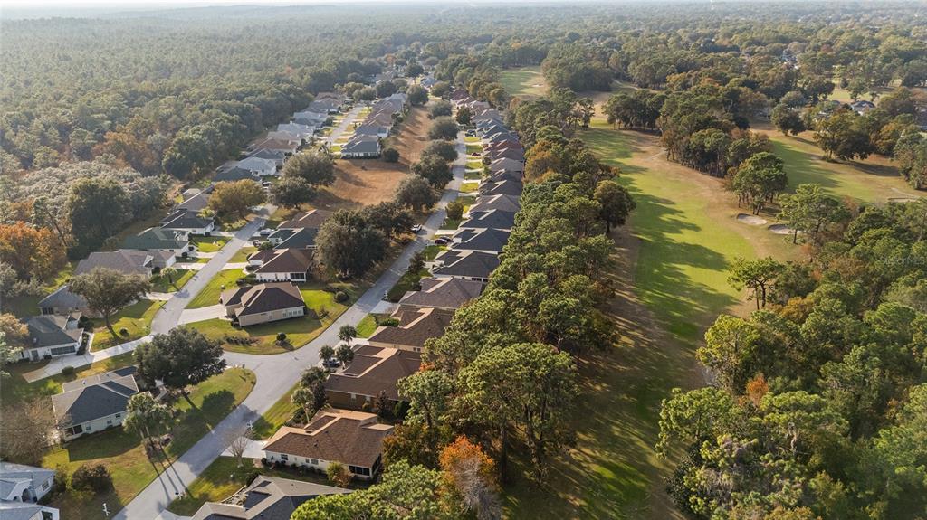 11621 Southwest 72nd Circle Ocala, FL 34476 - Photo 53 of 66 an aerial view of residential house with parking space